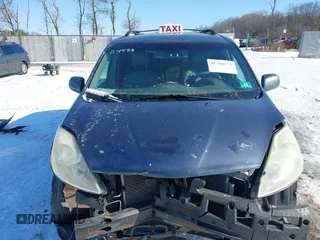 2007 Toyota Sienna XLE with VIN 5TDZK22C27S035151, listed as a IAAI auction lot 41380573 with 282,903 mi miles. Bid and sale history available at carsss.com. Image 12.