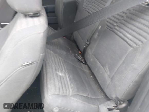 2023 Ford F-150 XL with VIN 1FTEX1CP9PKD57496, listed as a IAAI auction lot 40744859 with 56,487 mi miles and . Bid and sale history available at DreamBid. Image 8.