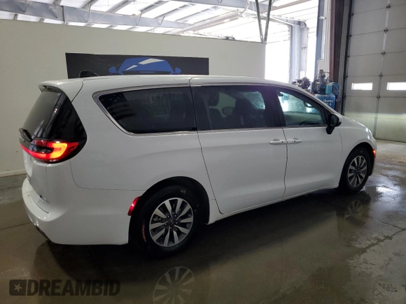 2023 Chrysler Pacifica Hybrid Touring L with VIN 2C4RC1L75PR611607, listed as a Copart auction lot 61475985 with 63,241 mi miles and Clean title. Bid and sale history available at DreamBid. Image 3.