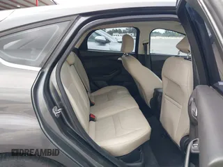 2017 Ford Focus Titanium with VIN 1FADP3N20HL210364, listed as a IAAI auction lot 42130643 with 132,312 mi miles and . Bid and sale history available at DreamBid. Image 8.