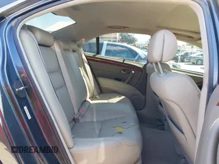 2006 Acura RL z VIN JH4KB16516C004396, wystawiony jako IAAI lot #41959850 z przebiegiem 114 670 mil mil oraz . Historia ofert i sprzedaży dostępna na DreamBid. Obrazek 8.