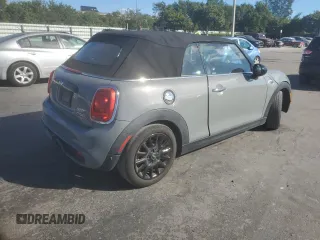 2017 MINI Convertible Cooper S z VIN WMWWG9C34H3C81536, wystawiony jako Copart lot #81806704 z przebiegiem 60 800 mil mil oraz Czysty tytuł • Clean title. Historia ofert i sprzedaży dostępna na DreamBid. Obrazek 3.