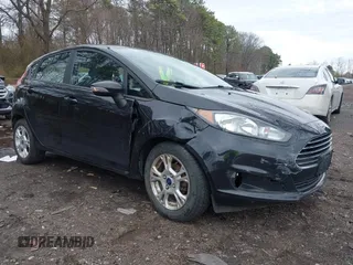 2015 Ford Fiesta SE with VIN 3FADP4EJ9FM175123, listed as a IAAI auction lot 41948452 with 130,801 mi miles. Bid and sale history available at carsss.com. Image 6.