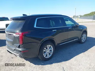 2021 Cadillac XT6 Luxury with VIN 1GYKPAR48MZ171154, listed as a IAAI auction lot 41639465 with 41,183 mi miles. Bid and sale history available at carsss.com. Image 4.
