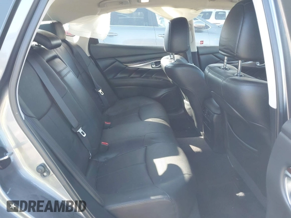 2018 Infiniti Q70 Luxe with VIN JN1BY1AR3JM220783, listed as a IAAI auction lot 41480241 with 95,739 mi miles and . Bid and sale history available at DreamBid. Image 8.