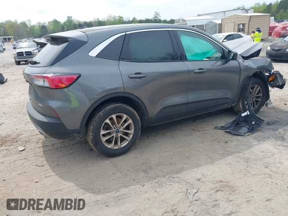2022 Ford Escape SE with VIN 1FMCU9G64NUB95256, listed as a IAAI auction lot 42010127 with 32,009 mi miles and . Bid and sale history available at DreamBid. Image 4.