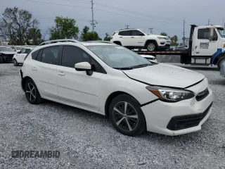 2022 Subaru Impreza Premium with VIN 4S3GTAD66N3710522, listed as a Copart auction lot 59011985 with 42,962 mi miles and Salvage title. Bid and sale history available at DreamBid. Image 4.
