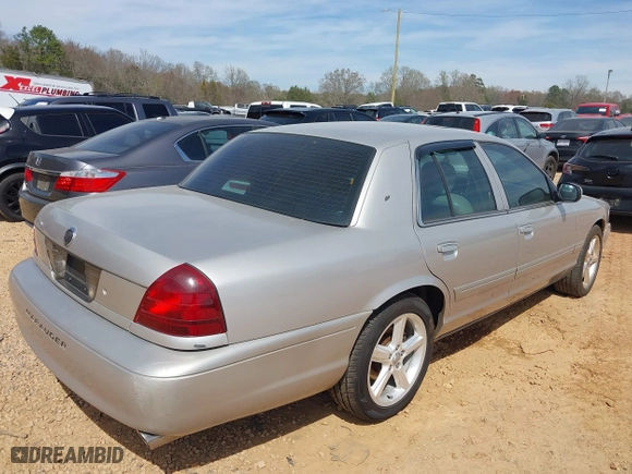 2004 Mercury Marauder with VIN 2MHHM79V74X675447, listed as a IAAI auction lot 41833704 with 244,849 mi miles. Bid and sale history available at carsss.com. Image 4.