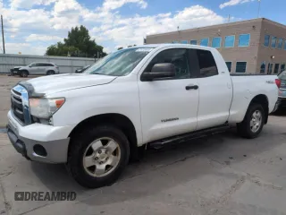 2013 Toyota Tundra with VIN 5TFUM5F14DX047175, listed as a Copart auction lot 61670655 with 131,998 mi miles and Salvage title. Bid and sale history available at DreamBid. Image 1.