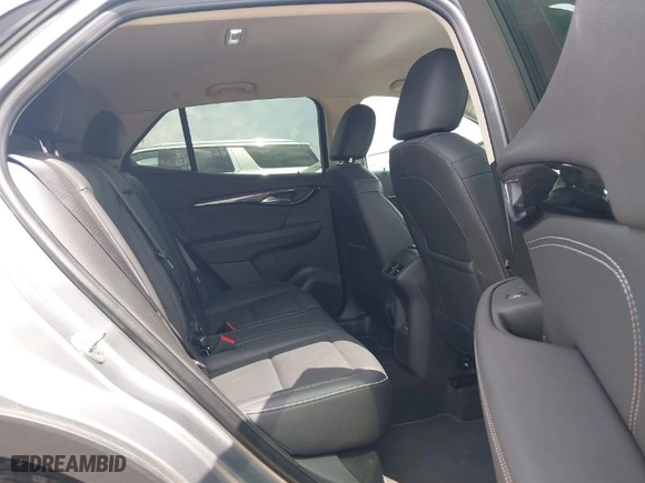 2023 Buick Envision Essence with VIN LRBFZNR4XPD056225, listed as a IAAI auction lot 42094766 with 59,403 mi miles. Bid and sale history available at carsss.com. Image 8.