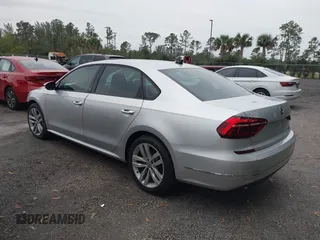 2019 Volkswagen Passat 2.0T Wolfsburg Edition with VIN 1VWLA7A3XKC007385, listed as a IAAI auction lot 41409014 with 36,208 mi miles. Bid and sale history available at carsss.com. Image 3.