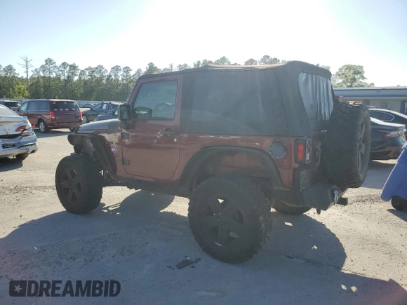 2008 Jeep Wrangler Sahara z VIN 1J4FA54148L610723, wystawiony jako Copart lot #52085525 z przebiegiem 158 057 mil mil oraz Czysty tytuł • Clean title. Historia ofert i sprzedaży dostępna na DreamBid. Obrazek 2.