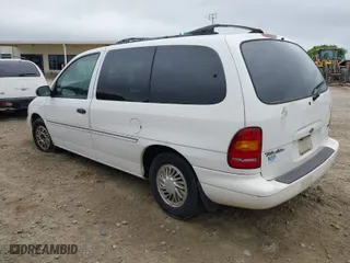 1998 Ford Windstar Wagon LX with VIN 2FMZA5148WBD66410, listed as a IAAI auction lot 41917365 with 229,928 mi miles. Bid and sale history available at carsss.com. Image 3.