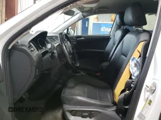 2018 Volkswagen Tiguan SEL with VIN 3VV2B7AX9JM065985, listed as a Copart auction lot 79404694 with Not provided miles and Salvage title. Bid and sale history available at DreamBid. Image 7.