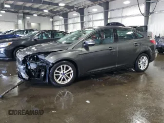 2017 Ford Focus SE with VIN 1FADP3F21HL205754, listed as a Copart auction lot 67166984 with 83,617 mi miles and Salvage title. Bid and sale history available at DreamBid. Image 1.