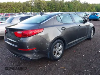 2015 Kia Optima LX z VIN 5XXGM4A79FG397995, wystawiony jako IAAI lot #42175785 z przebiegiem 159 239 mil mil oraz . Historia ofert i sprzedaży dostępna na DreamBid. Obrazek 6.