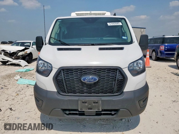 2023 Ford Transit Cargo с VIN 1FTBR1Y81PKB48106, выставлен на аукционе Copart как лот 57442685 с пробегом 11 889 миль миль и Списание • Salvage title. История ставок и продаж доступна на DreamBid. Изображение 5.