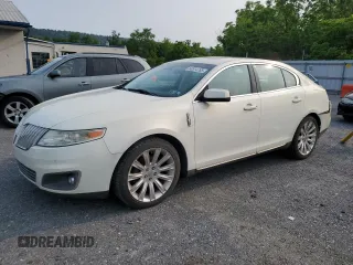 2012 Lincoln MKS z VIN 1LNHL9ER0CG803078, wystawiony jako Copart lot #60514765 z przebiegiem 82 715 mil mil oraz Szkoda całkowita • Salvage title. Historia ofert i sprzedaży dostępna na DreamBid. Obrazek 1.