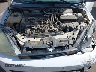 2004 Ford Focus SE z VIN 1FAFP34Z44W103852, wystawiony jako IAAI lot #42395073 z przebiegiem Nie podano mil oraz . Historia ofert i sprzedaży dostępna na DreamBid. Obrazek 10.