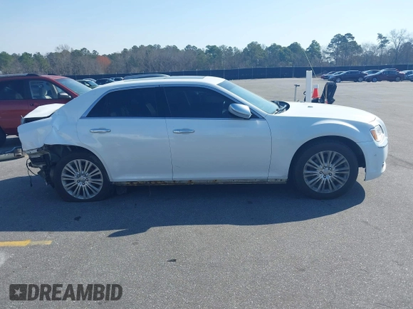 2013 Chrysler 300 Luxury Series with VIN 2C3CCASGXDH573689, listed as a IAAI auction lot 41782712 with 204,746 mi miles and . Bid and sale history available at DreamBid. Image 14.