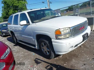 2003 GMC Yukon Denali z VIN 1GKEK63UX3J314453, wystawiony jako IAAI lot #42307306 z przebiegiem 184 136 mil mil oraz . Historia ofert i sprzedaży dostępna na DreamBid. Obrazek 1.