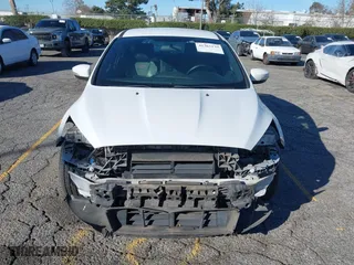 2015 Ford Focus ST with VIN 1FADP3L92FL380352, listed as a IAAI auction lot 41365139 with 136,226 mi miles. Bid and sale history available at carsss.com. Image 13.