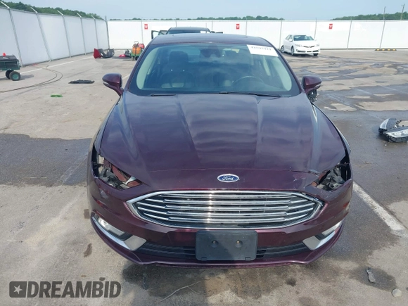 2017 Ford Fusion Titanium z VIN 3FA6P0K94HR271307, wystawiony jako IAAI lot #42595411 z przebiegiem 100 344 mil mil oraz . Historia ofert i sprzedaży dostępna na DreamBid. Obrazek 13.