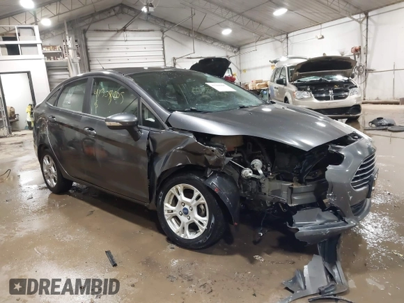 2015 Ford Fiesta SE with VIN 3FADP4BJ9FM164093, listed as a IAAI auction lot 41308905 with 75,839 mi miles. Bid and sale history available at carsss.com. Image 1.