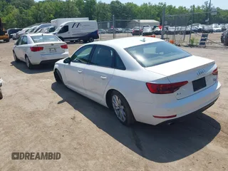 2017 Audi A4 Premium with VIN WAUANAF44HN002447, listed as a IAAI auction lot 42589741 with 71,960 mi miles and . Bid and sale history available at DreamBid. Image 3.