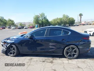 2021 Mazda 3 S with VIN JM1BPAALXM1326956, listed as a IAAI auction lot 42304248 with 55,104 mi miles and . Bid and sale history available at DreamBid. Image 15.