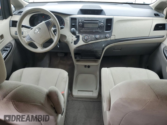 2014 Toyota Sienna L with VIN 5TDZK3DC3ES499663, listed as a Copart auction lot 57615535 with 201,561 mi miles and Salvage title. Bid and sale history available at DreamBid. Image 8.