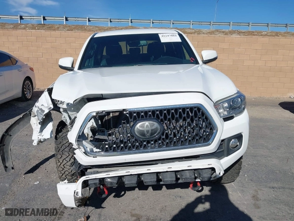 2019 Toyota Tacoma 4WD SR5 with VIN 3TMDZ5BN1KM079305, listed as a IAAI auction lot 41247804 with 98,494 mi miles. Bid and sale history available at carsss.com. Image 12.