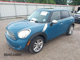 2012 MINI Countryman with VIN WMWZB3C56CWM06101, listed as a IAAI auction lot 42223616 with 149,680 mi miles and . Bid and sale history available at DreamBid. Image 2.