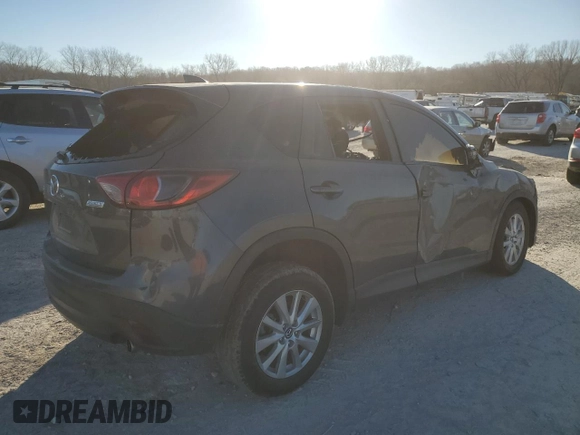 2015 Mazda CX-5 Touring with VIN JM3KE4CY4F0432335, listed as a Copart auction lot 83258294 with 0 mi miles and Non Repairable. Bid and sale history available at carsss.com. Image 3.