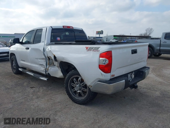 2016 Toyota Tundra SR z VIN 5TFRM5F10GX097792, wystawiony jako IAAI lot #41516069 z przebiegiem 199 598 mil mil oraz . Historia ofert i sprzedaży dostępna na DreamBid. Obrazek 3.