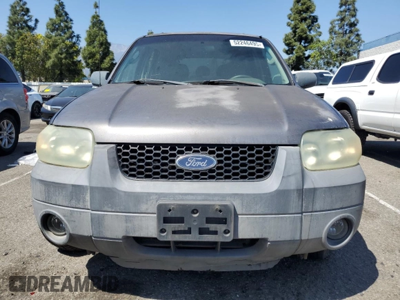 2005 Ford Escape XLT z VIN 1FMYU03155KB11291, wystawiony jako Copart lot #52246495 z przebiegiem Nie podano mil oraz Szkoda całkowita • Salvage title. Historia ofert i sprzedaży dostępna na DreamBid. Obrazek 5.