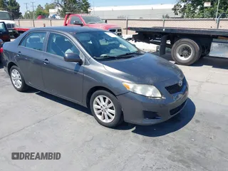 2009 Toyota Corolla with VIN JTDBL40E99J002548, listed as a IAAI auction lot 42718387 with 198,390 mi miles and . Bid and sale history available at DreamBid. Image 1.