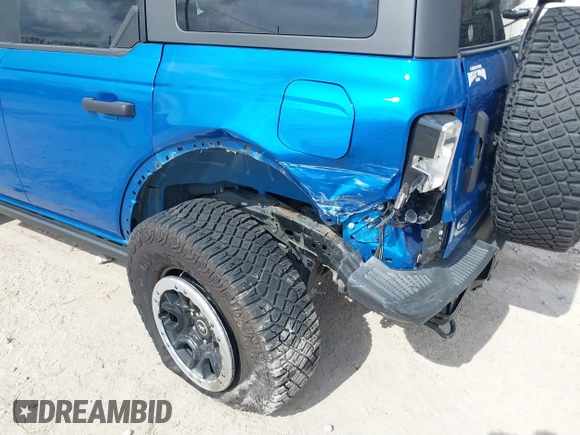 2023 Ford Bronco z VIN 1FMEE5DH6PLB09202, wystawiony jako IAAI lot #41059734 z przebiegiem 30 186 mil mil oraz . Historia ofert i sprzedaży dostępna na DreamBid. Obrazek 6.