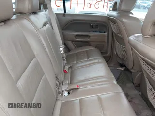 2007 Honda Pilot EX-L with VIN 5FNYF185X7B008285, listed as a IAAI auction lot 41869795 with 238,516 mi miles. Bid and sale history available at carsss.com. Image 8.