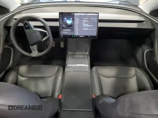 2024 Tesla Model 3 Long Range with VIN 5YJ3E1EBXRF818977, listed as a Copart auction lot 47303885 with 14,189 mi miles and Salvage Title. Bid and sale history available at DreamBid. Image 8.