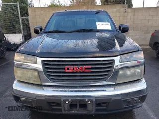 2010 GMC Canyon z VIN 1GTJSFDP6A8134412, wystawiony jako IAAI lot #41589150 z przebiegiem 164 232 mil mil oraz . Historia ofert i sprzedaży dostępna na DreamBid. Obrazek 12.