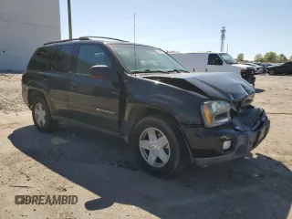 2002 Chevrolet TrailBlazer LTZ with VIN 1GNDT13S322212983, listed as a Copart auction lot 53608405 with 107,187 mi miles and Salvage Title. Bid and sale history available at DreamBid. Image 4.