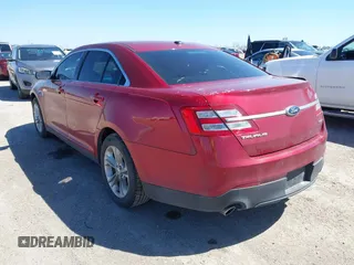 2013 Ford Taurus SEL with VIN 1FAHP2E8XDG231807, listed as a IAAI auction lot 41774166 with 120,639 mi miles and . Bid and sale history available at carsss.com. Image 3.