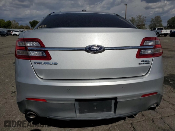 2015 Ford Taurus SEL with VIN 1FAHP2E88FG121647, listed as a Copart auction lot 51660585 with 155,686 mi miles and Clean Title. Bid and sale history available at DreamBid. Image 6.