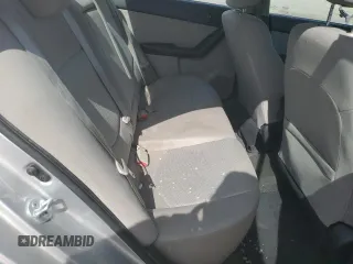 2010 Kia Forte EX z VIN KNAFU4A22A5828445, wystawiony jako Copart lot #51564313 z przebiegiem 114 961 mil mil oraz Szkoda całkowita • Salvage title. Historia ofert i sprzedaży dostępna na DreamBid. Obrazek 10.