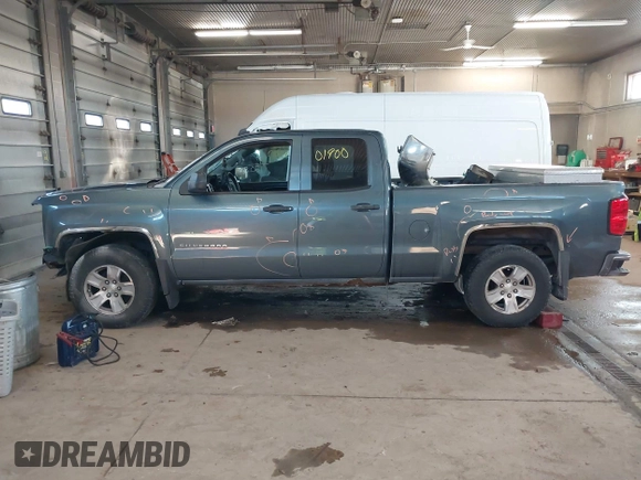 2014 Chevrolet Silverado 1500 LT with VIN 1GCVKREC0EZ130211, listed as a IAAI auction lot 41601900 with 209,604 mi miles and . Bid and sale history available at DreamBid. Image 15.