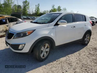 2012 Kia Sportage LX with VIN KNDPBCA21C7233424, listed as a Copart auction lot 61829465 with 129,526 mi miles and Salvage title. Bid and sale history available at DreamBid. Image 1.