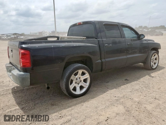 2005 Dodge Dakota ST z VIN 1D7HE28K35S235225, wystawiony jako Copart lot #57684725 z przebiegiem 184 546 mil mil oraz Szkoda całkowita • Salvage title. Historia ofert i sprzedaży dostępna na DreamBid. Obrazek 3.