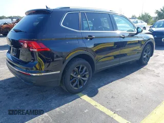 2024 Volkswagen Tiguan SE with VIN 3VVNB7AXXRM199400, listed as a IAAI auction lot 42216941 with 11,581 mi miles and . Bid and sale history available at DreamBid. Image 4.