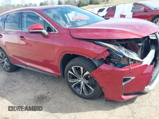 2018 Lexus RX 350L Premium with VIN JTJDZKCA3J2004828, listed as a IAAI auction lot 41810945 with 51,687 mi miles and . Bid and sale history available at DreamBid. Image 17.